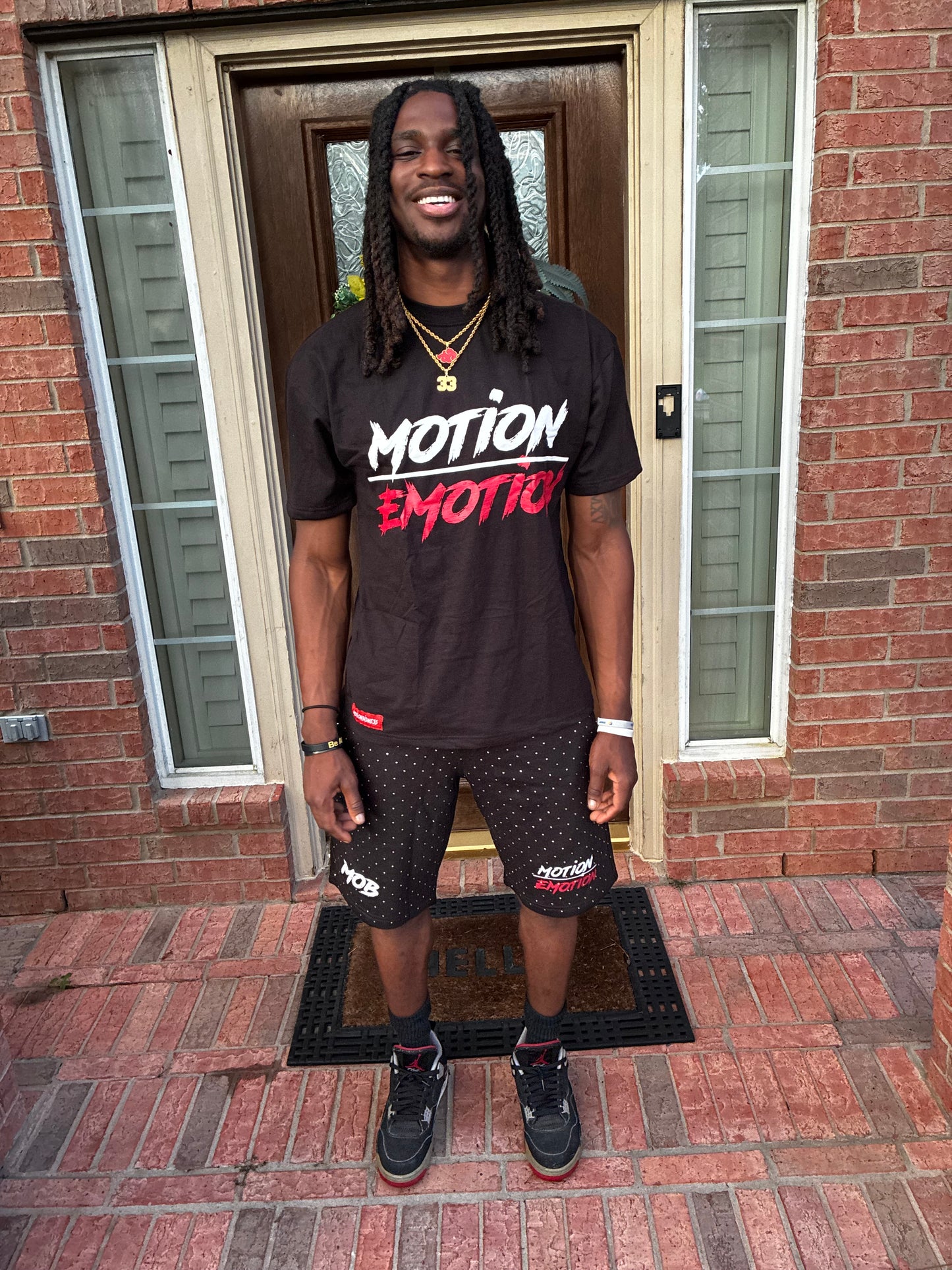 MOTION OVER EMOTION BLACK TEES