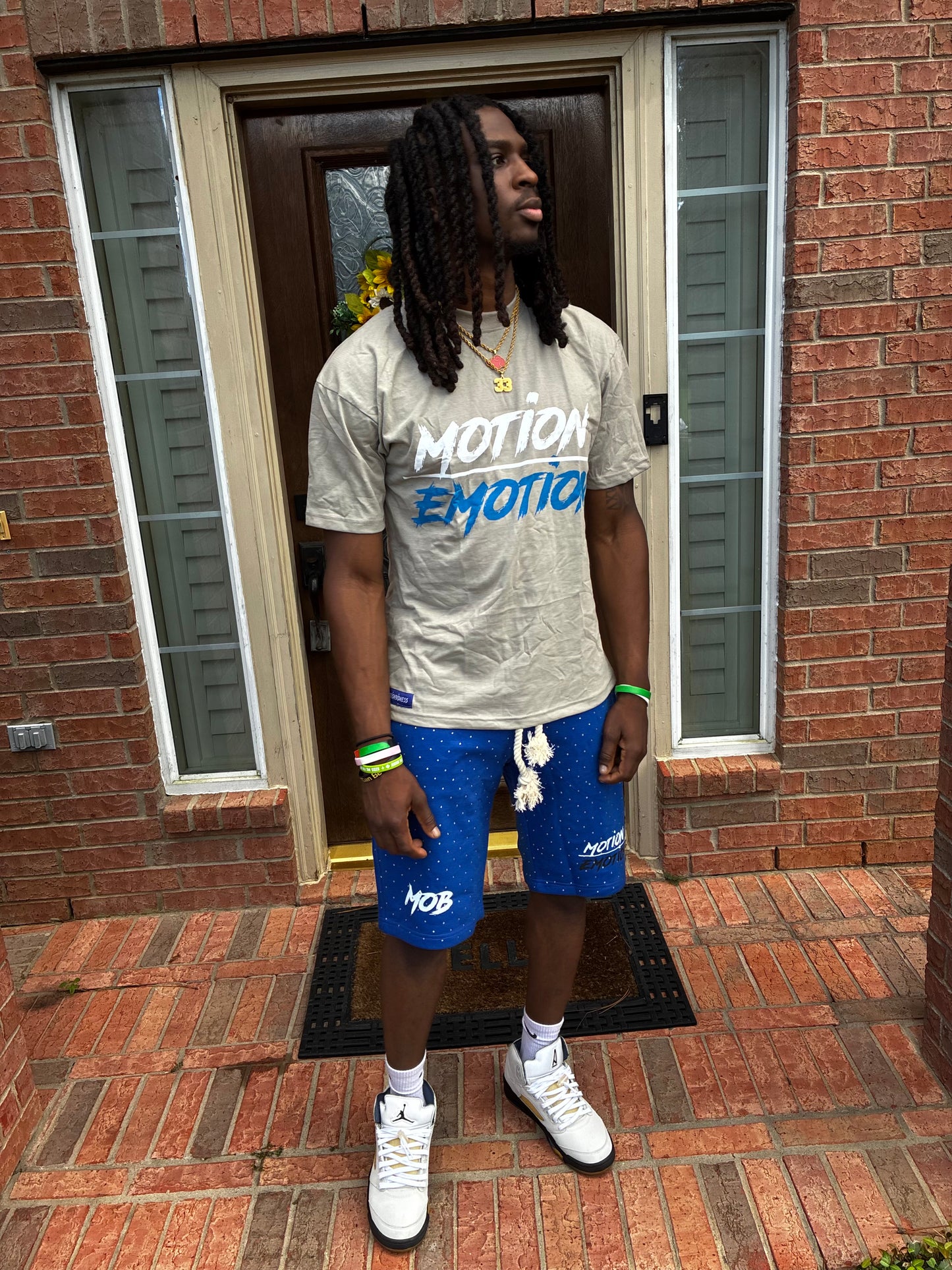 MOTION OVER EMOTION BLUE TEE